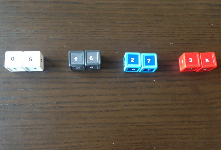 Dice, As Shown In Strength From Left To Right. White Is Weakest, Red Is Strongest. Prototype Shown